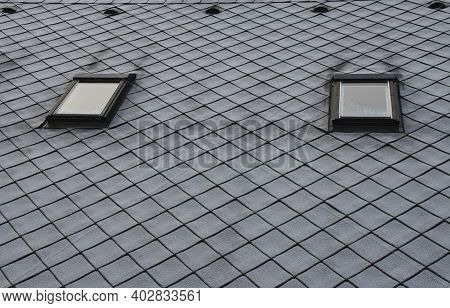 Gray Roof Tiles With Windows Square Slate Template. Laid Obliquely. Square Grid Pattern. The Lower E