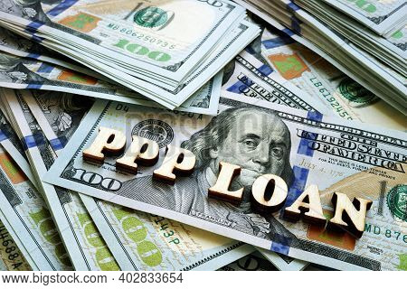 Ppp Loan Letters On The Cash. Paycheck Protection Program Concept.