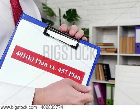Manager Shows Papers 401k Plan Vs 457 Plan Comparison Concept.