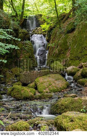 Long Exposure Clampitt Falls Waterfall At Canonteign Falls In Dartmoor