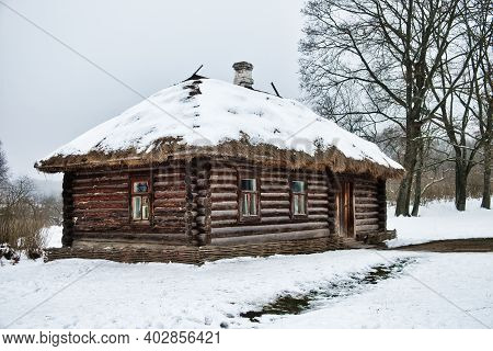 Yasnaya Polyana, Tula Region, Russia - 2021-01-04 - Old Traditional Russian Wooden House Izba. Large