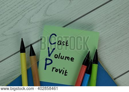 Cost Volume Provit Write On Sticky Notes Isolated On Wooden Table.