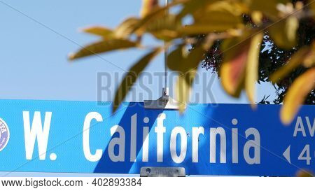 California Street Road Sign On Crossroad. Lettering On Intersection Signpost, Symbol Of Summertime T