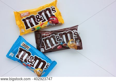 Kyiv - January 12, 2021: Closeup Of M&m's Milk Chocolate Candies Made By Mars Inc. On White Backgrou