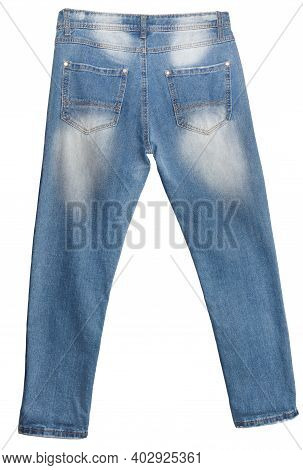 Back Of Light Blue Jeans Isolated On White Background. Faded White Spots On The Waist And Legs Area.