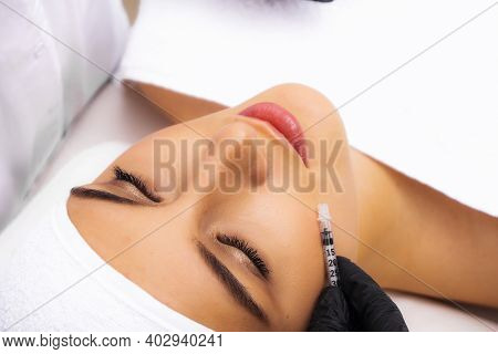 Mesotherapy Procedure. The Girl At The Beautician's Biorevitalization Procedure. Fillers For Facial 