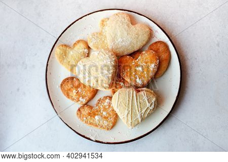 Heart Shaped Cookies On The Plate For Valentine's Day , Sweet Food