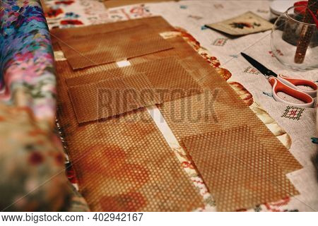 Hand made yellow candles from natural bee wax. The process of creating candles with your own hands. 