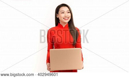 Woman In Vietnamese Tranditional Costume Hold With Gift Box