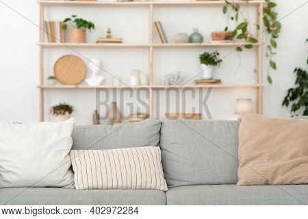 Modern Interior, Cozy Living Room Design, Scandinavian Style. Gray Sofa With Different Pillows, Next