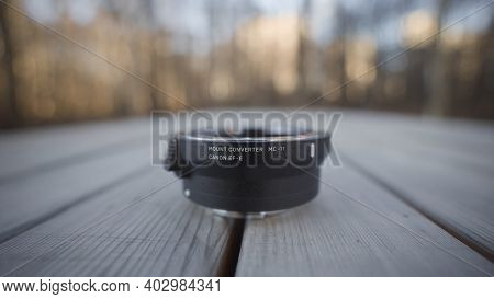 Russia, Moscow-december, 2020: Close-up Of Professional Camera Lens. Action. Lens For Professional C