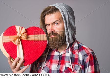 Heart Shape Box. Man Holds Valentines Gift Box. Bearded Man Holds Heart Gift Box. Present With Love.
