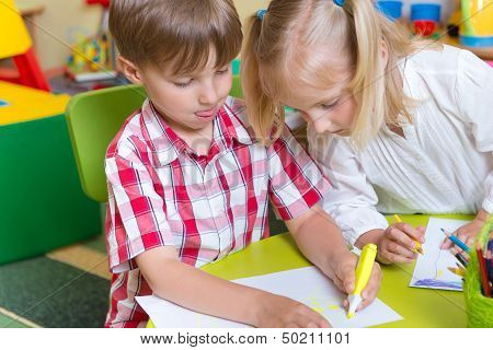 Two Cute Little Prescool Kids Drawing