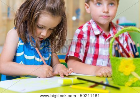 Two Cute Little Prescool Kids Drawing