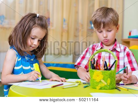 Two Cute Little Prescool Kids Drawing