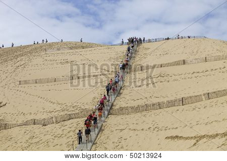 PYLA SUR MER, FRANCE - AUGUST 8: People visiting the Famous dune of Pyla, the highest sand dune in Europe, on August 8, 2012 in Pyla Sur Mer, France.