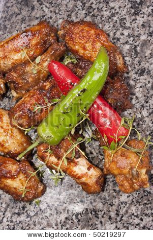 Grilled Chicken Wings On Marble