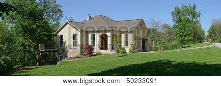 Panoramic view of house on a sunny day