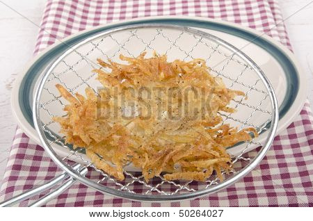 Hash Brown Is Placed On A Plate