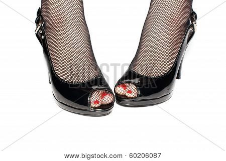 Female Legs In Black Shoes Isolated