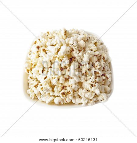 Popcorn in white bowl isolated on white background.