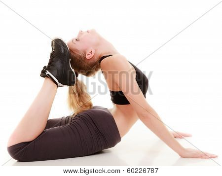 Young Sporty Girl Doing Stretching Exercise Isolated. Healthy Lifestyle