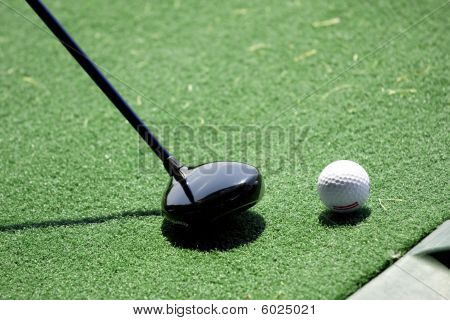 Golfboll och Club
