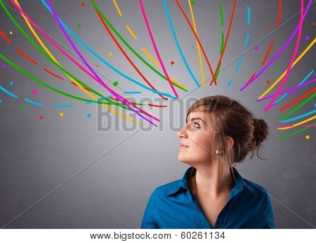 Pretty young girl thinking with colorful abstract lines overhead