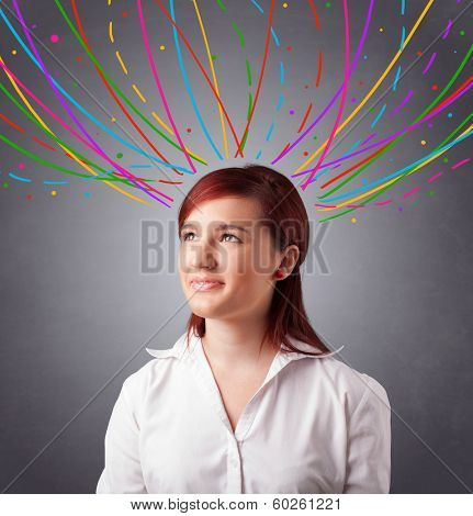 Pretty young girl thinking with colorful abstract lines overhead