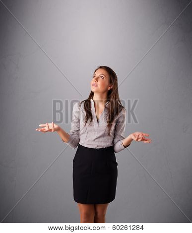 beautiful young lady standing and juggling with copy space