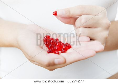Pills In Women Hands