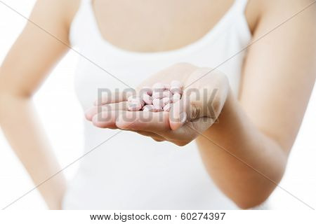 Pills In Women Hand