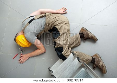 Unconscious Handyman On The Floor