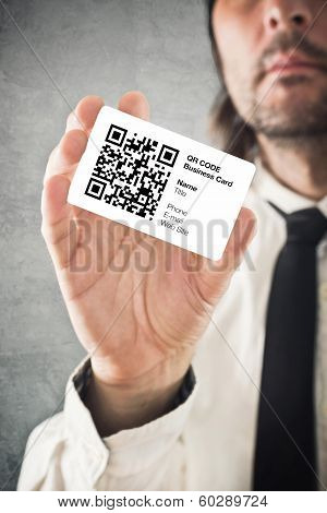 Businessman Holding Qr Code Business Card
