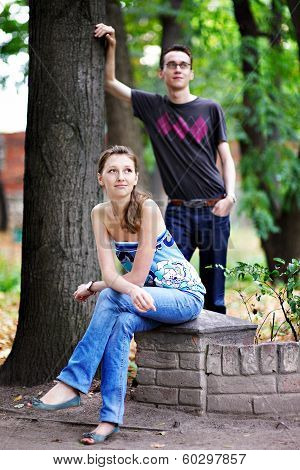 Man And Woman On A Walk In Park