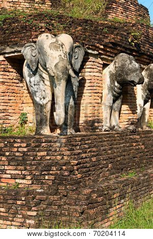 Elephants Statues On Ruins Of Buddhist Temple.