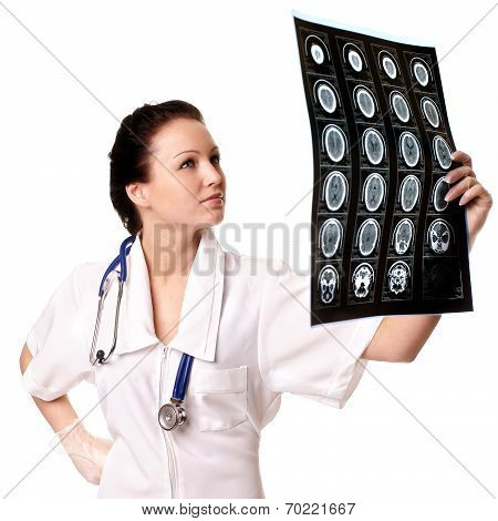 Woman Doctor With X-rays Of Brain