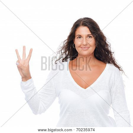 Closeup Portrait Of A Girl Showing Three Fingers