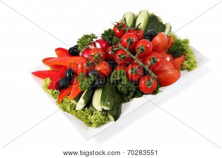 Assorted Vegetables On Plate Isolated On White Background.
