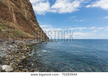 Coastline Of Madeira With High Cliffs Along The Atlantic Ocean