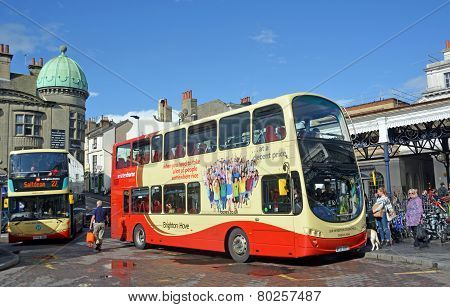 Tourists Taking A Double Decker Bus From Brighton Station, Uk.