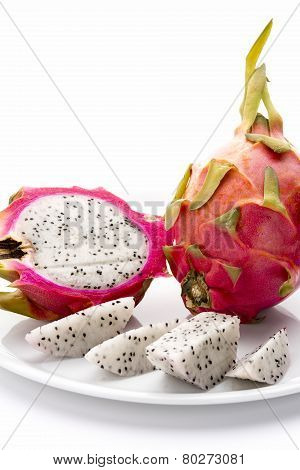 Pitaya And Its Fruit Flesh On A White Plate