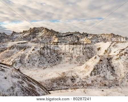 Snow-covered Peaks In The Badlands