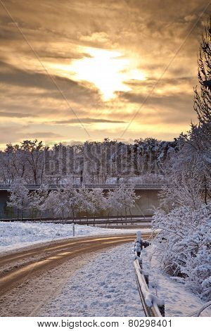 Snow Covered Street In Sunrise In Winter