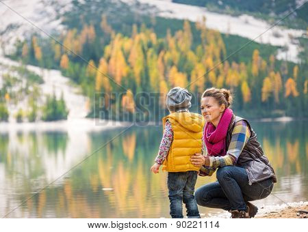 Mother Speaking To Daughter On The Shore Of Lake Bries