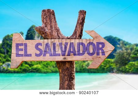 El Salvador wooden sign with beach background