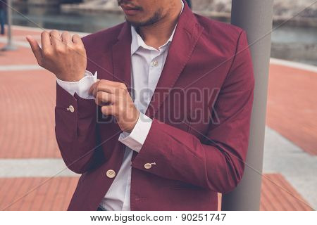 Handsome Asian Model Posing By An Artificial Basin