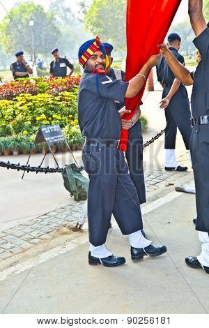 Soldiers Rise The Flag At The India Gate Monumen