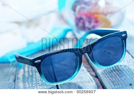 Sun Glasses And Flip Flops