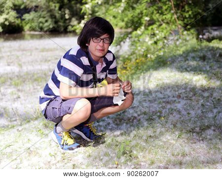 Young Boy With Pollen Allergy With White Handkerchief
